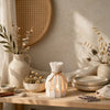 Spiga DEKO in PLA Bianco Osso: Porta tealight a covone di grano scandinavo alto 9 cm in luce naturale.