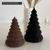 Foto reale di laboratorio DEKO a Galatone: Alberi Wave Trees stampati in 3D in PLA su banco di lavoro.